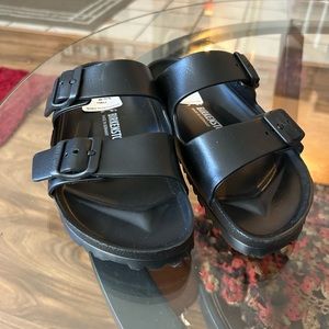 Black plastic Birkenstocks